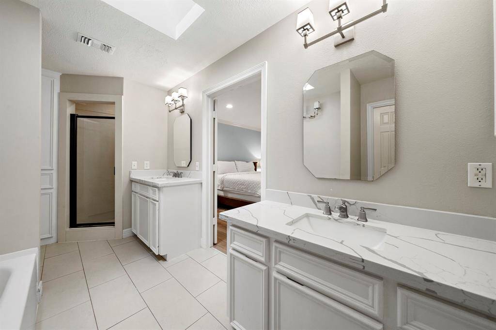Featuring two walk-in closets.
