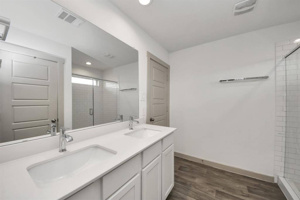 Primary bathroom with double vanities