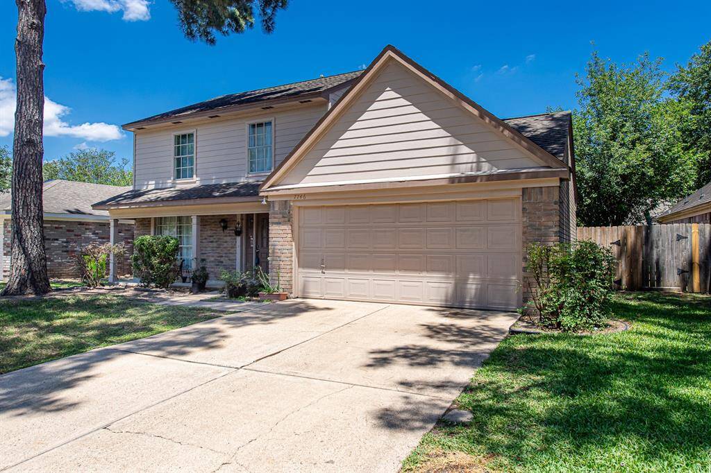 Two car garage and double wide driveway