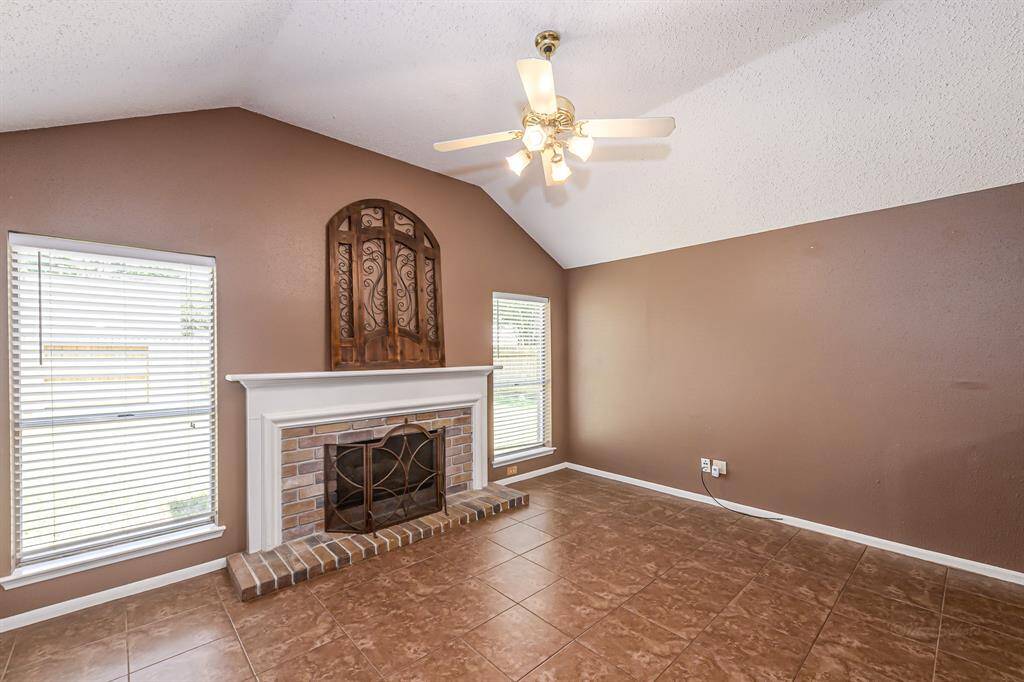 Large family room with wood burning fireplace