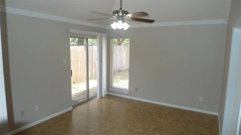 Large Comfy Primary Bedroom opens up to the back yard.