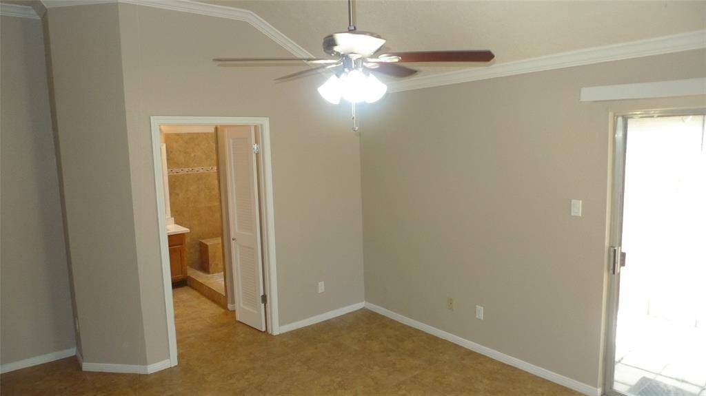 Primary suite looking into bathroom