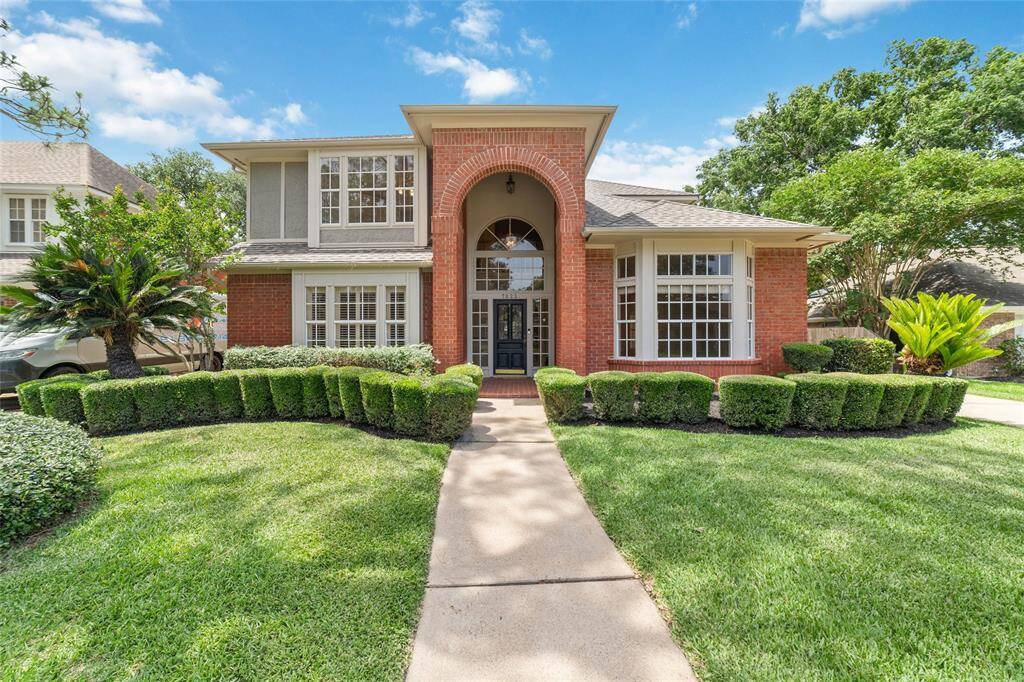 Discover your dream home at 7823 Green Devon Dr!
