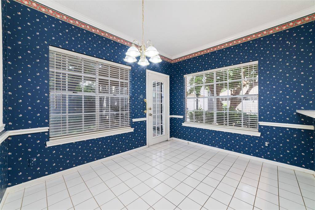 Cozy breakfast room with convenient access to the backyard and garage.
