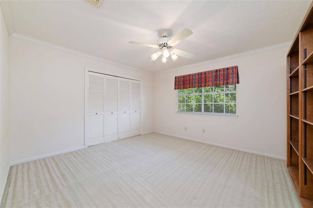 Large secondary bedroom with closet.