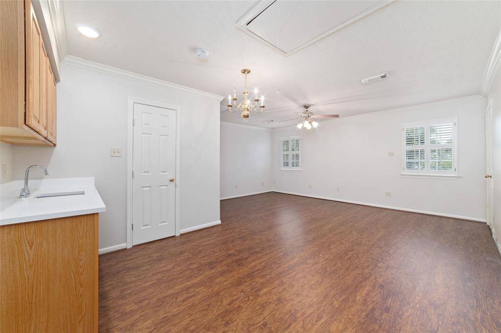 Garage apartment has room for bed and living furniture.