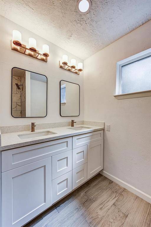 Renovated second bathroom with two sinks
