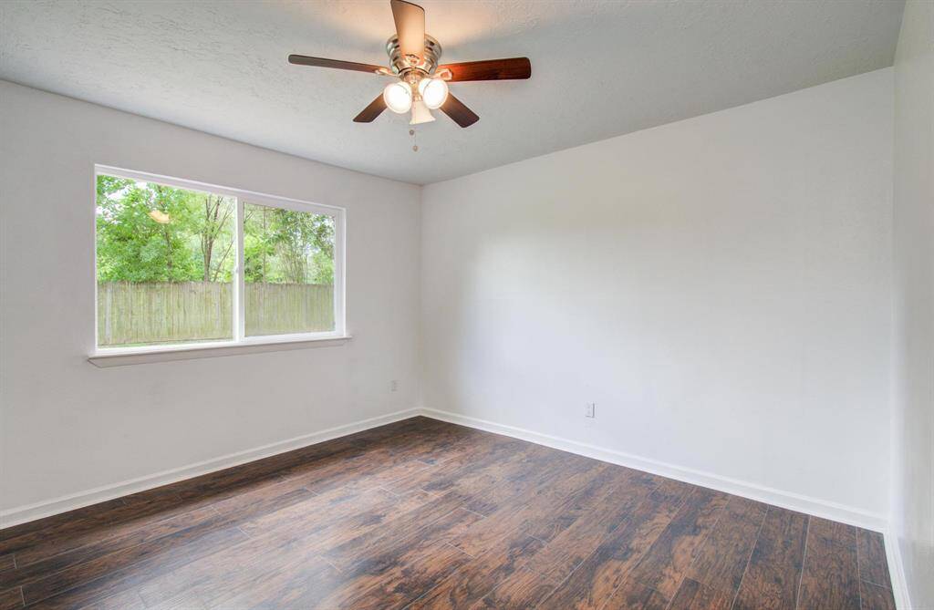 Third bedroom overlooking the backyard