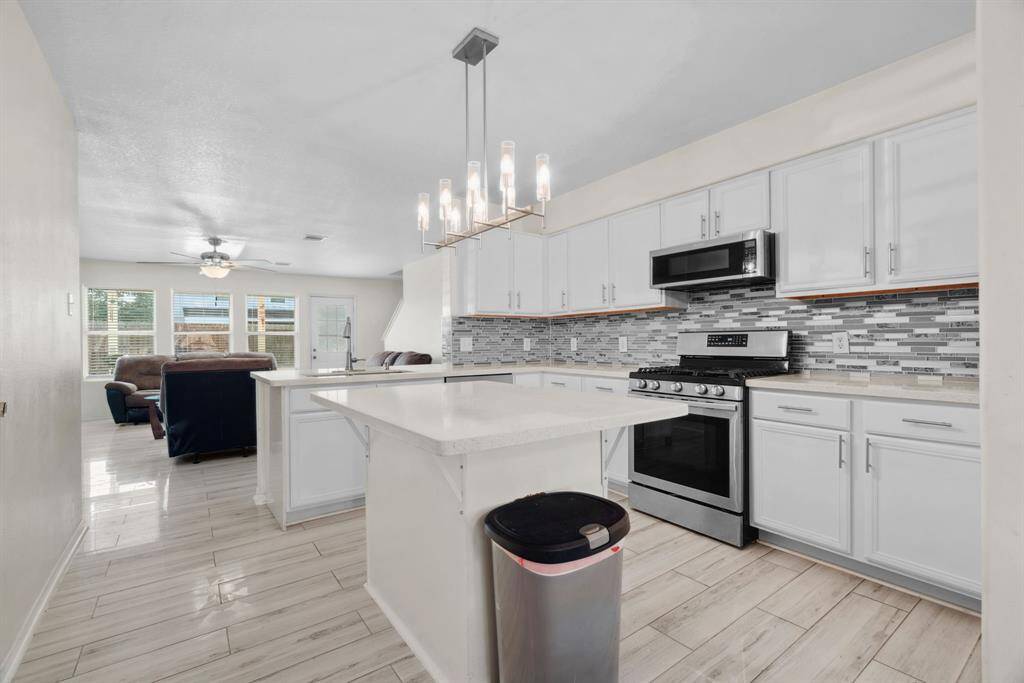 island offers extra counter space in the kitchen