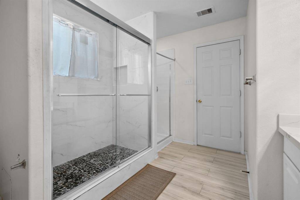 two showers with handicap accessibly