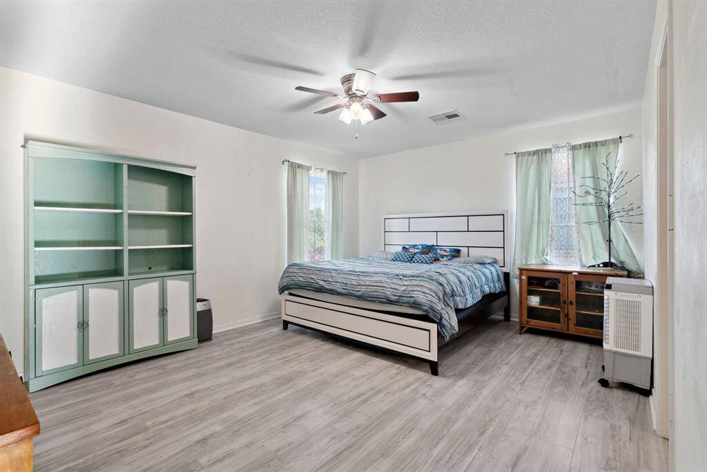 Large secondary bedrooms located upstairs