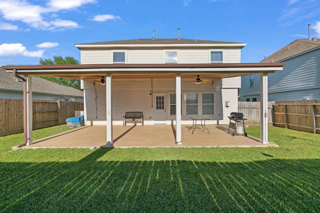 enjoy the Texas summer with this amazing covered patio!
