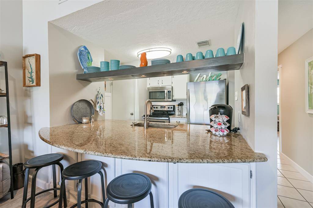 Oversized counter offers breakfast bar from LR