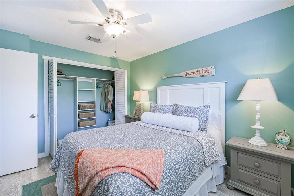 This is a queen size bed with two night stands and a large closet - plenty of room!