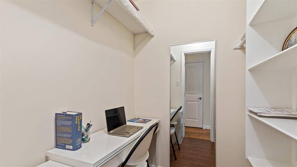 Spacious hall closet has been used as a quiet office nook!