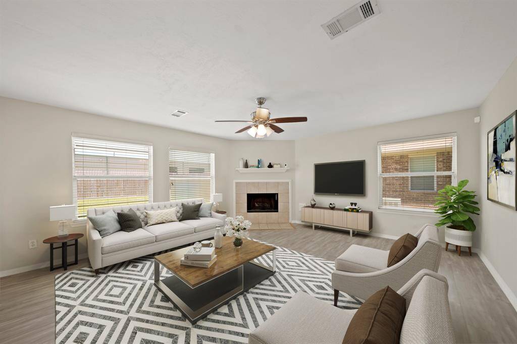 Virtually Staged: Fantastic open layout between the family room, breakfast nook, and kitchen.
