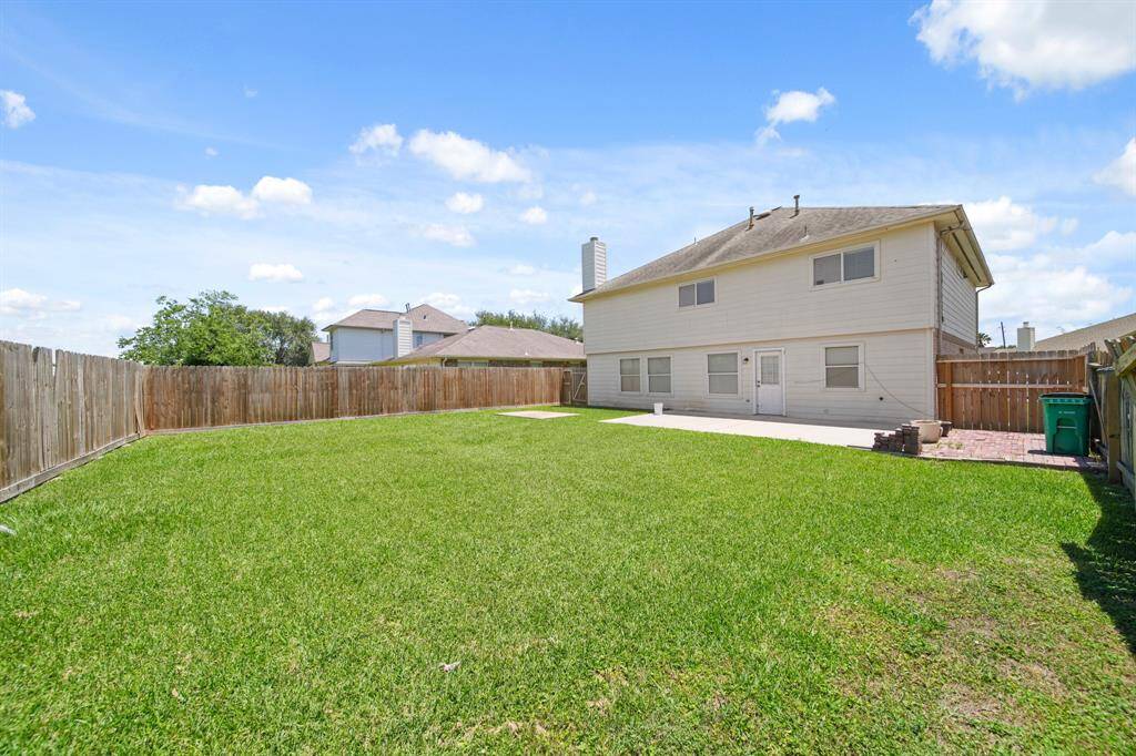 2-car garage with long driveway.