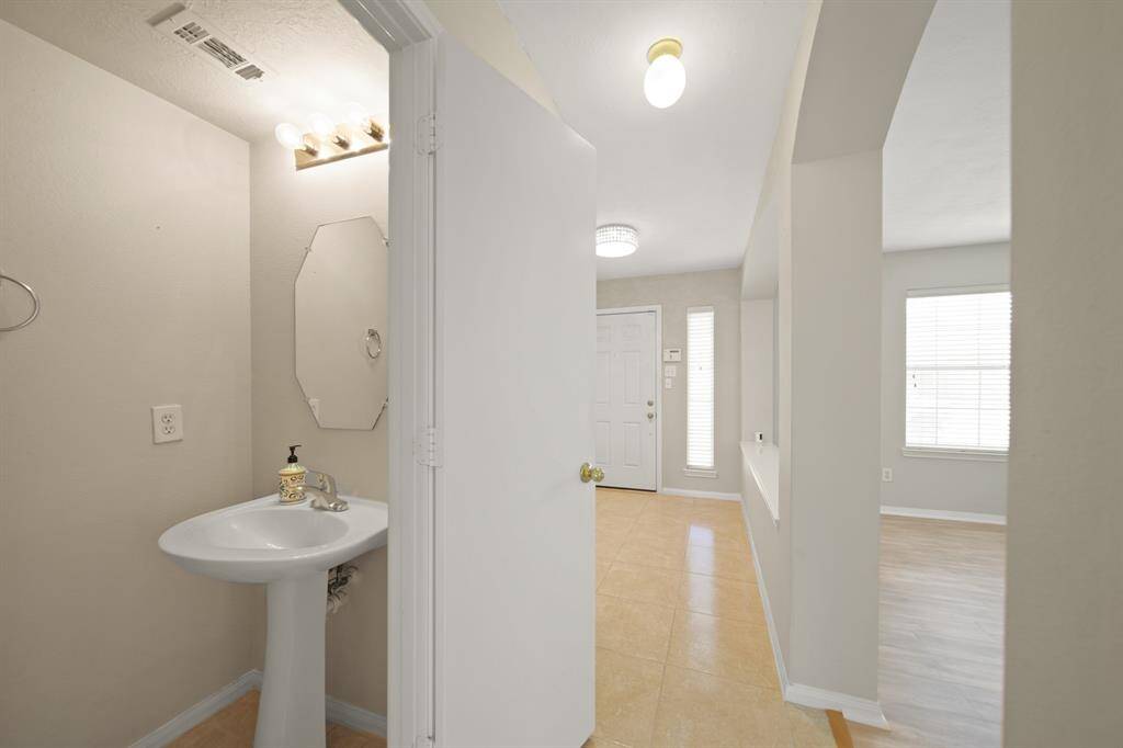 Virtually Staged: This charming breakfast area is great for enjoying a cup of coffee, and is open to kitchen.