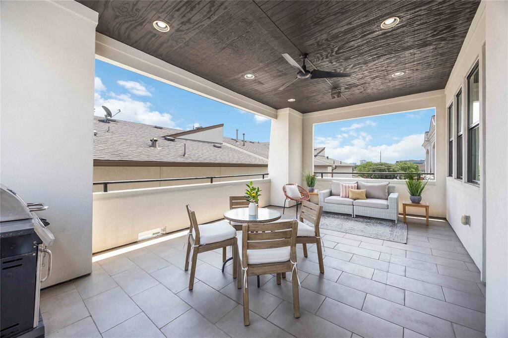 From the high ceiling to the tiled floor, you'll love relaxing or entertaining out here.