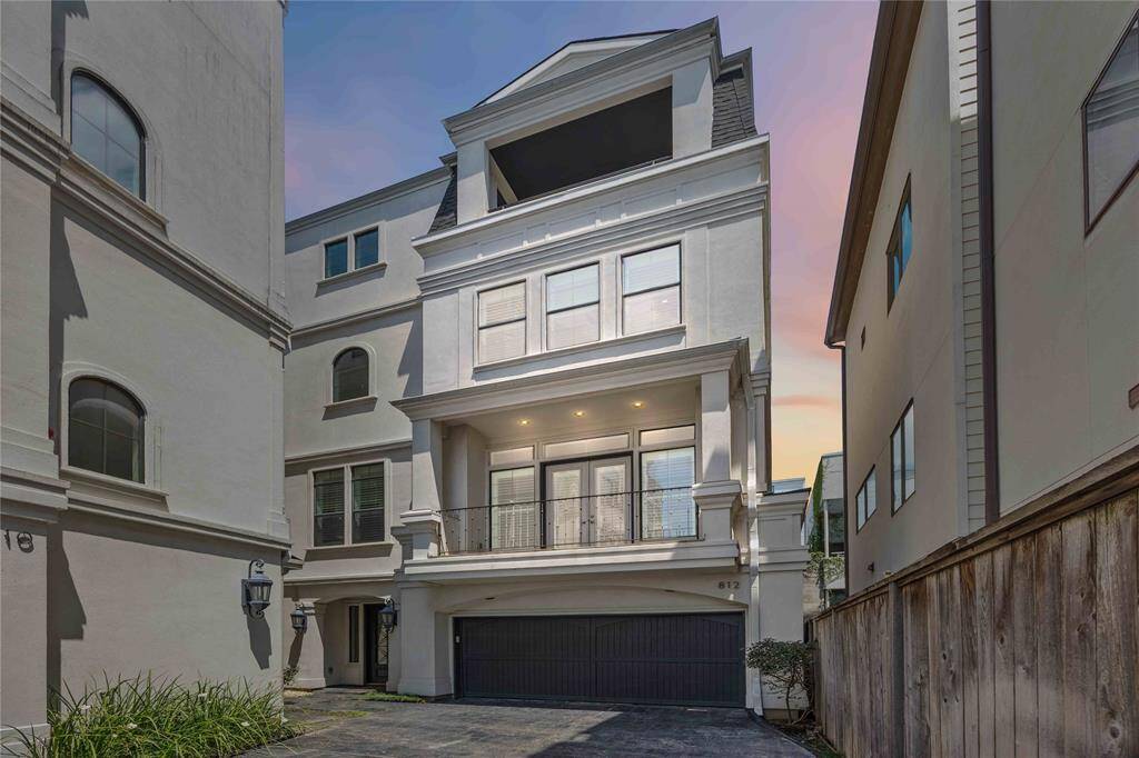 Reviewing some of the highlights in this incredible home... fresh paint, high-end finishes, recent carpet replacement in bedrooms, Italian Carrara marble countertops, JennAir appliances, built-in beverage coolers in the kitchen, game room, and primary suite, a gas log fireplace, 2 balconies, a game room, AND remember it's elevator-capable. Don't wait another day to schedule a tour! Welcome home!