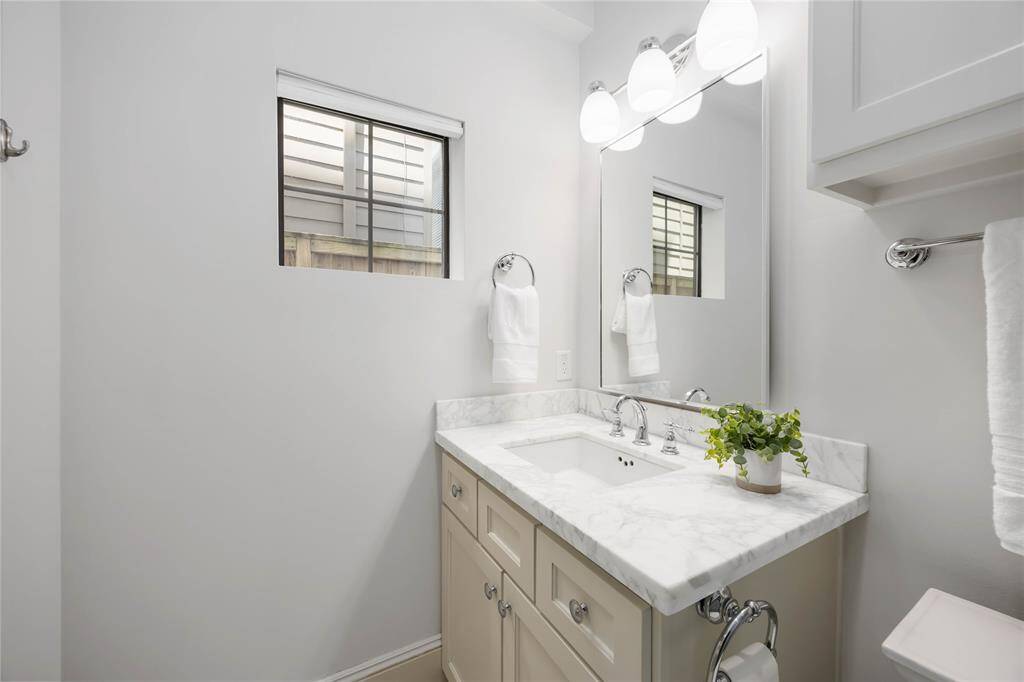 You'll find this exquisite Italian Carrara marble (seen here in the 1st-floor en suite bath) in all bathrooms as well as the kitchen.