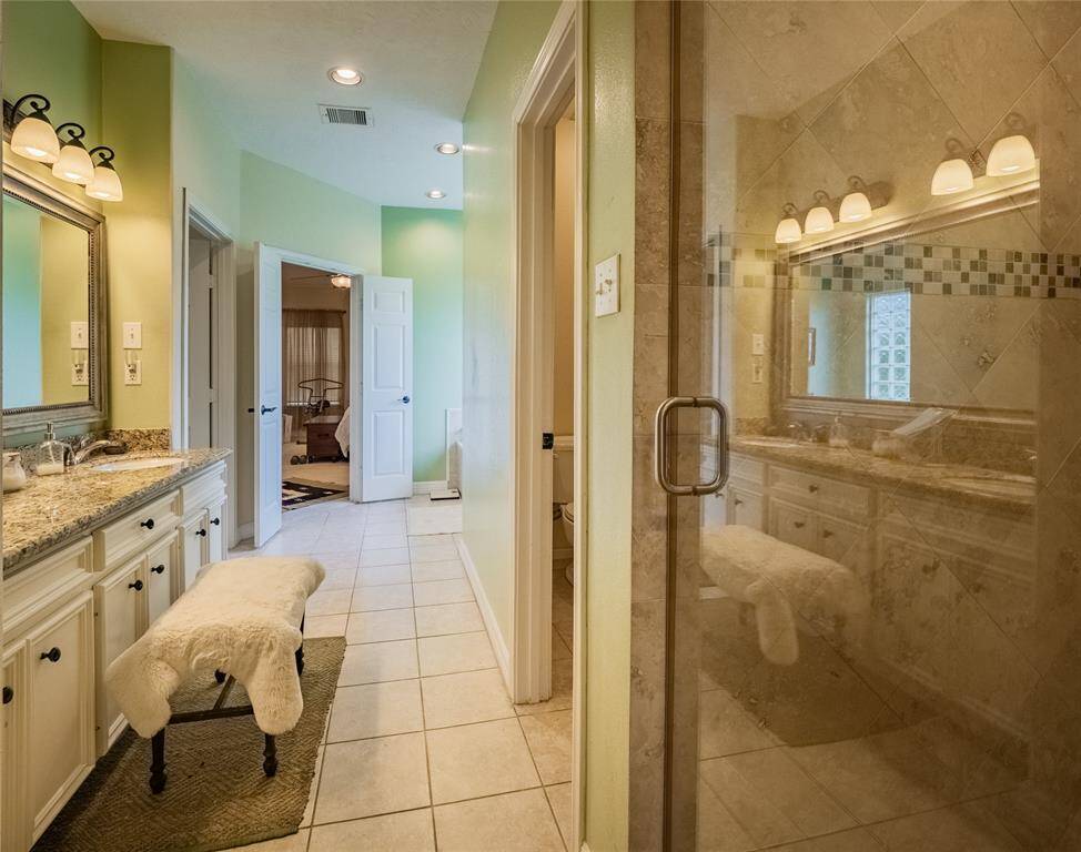 Primary bathroom with oversized shower.