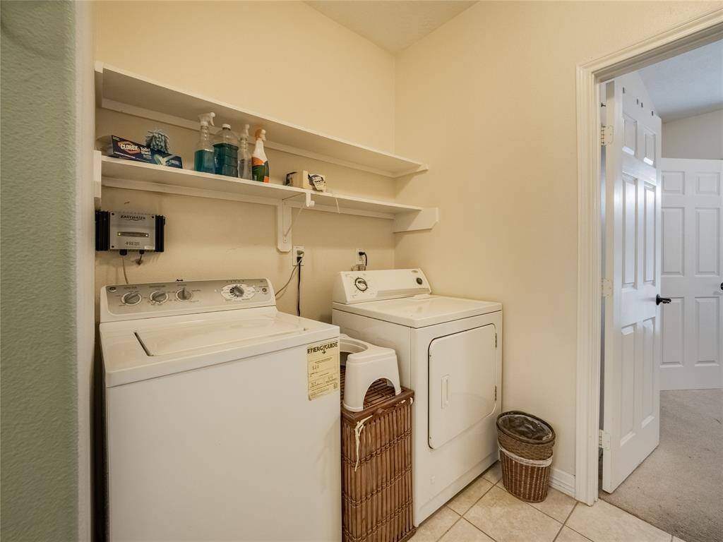 Laundry room off of the primary bathroom.