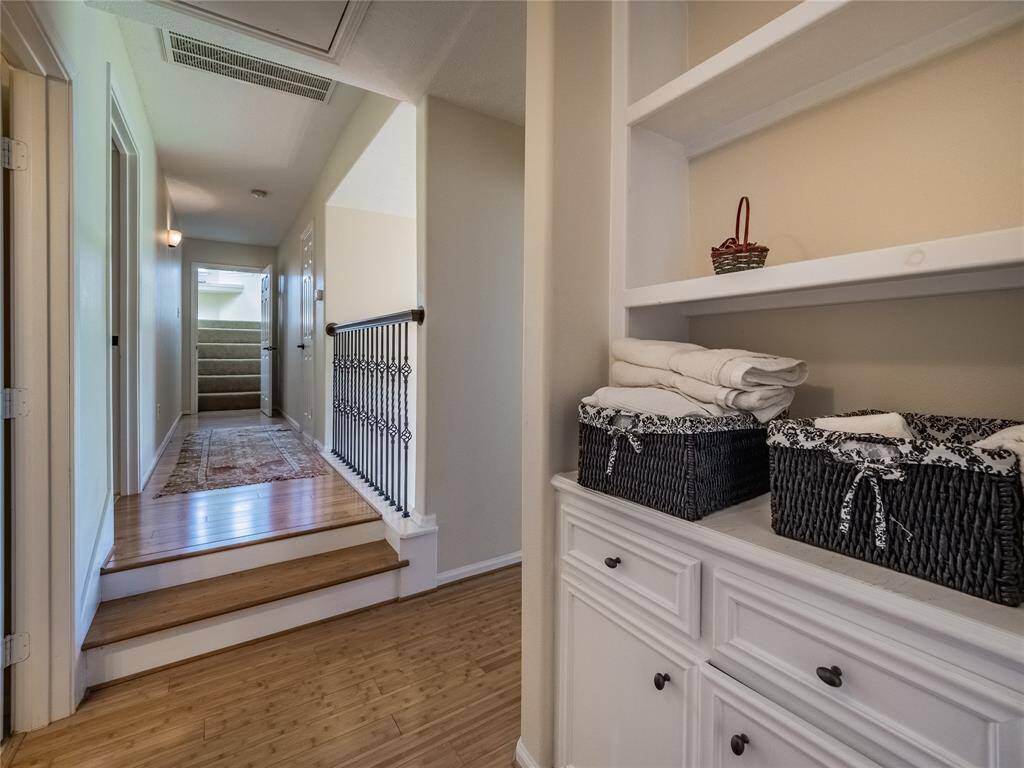 Second floor hallway leading to the sunroom.