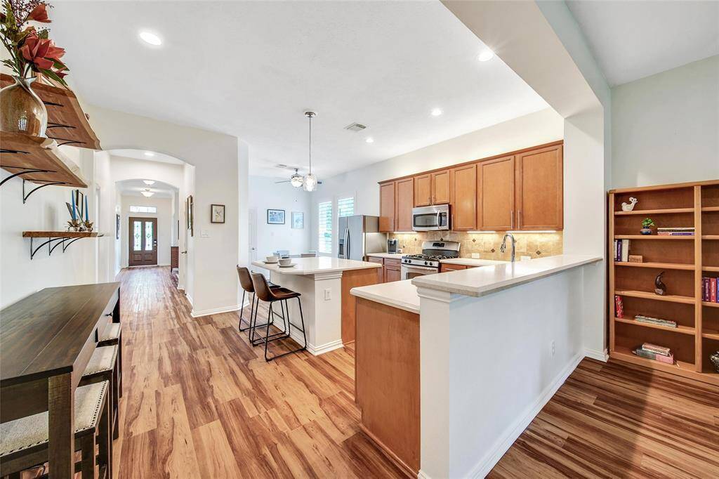 Gorgeous kitchen with sleek finishes and plenty of storage.