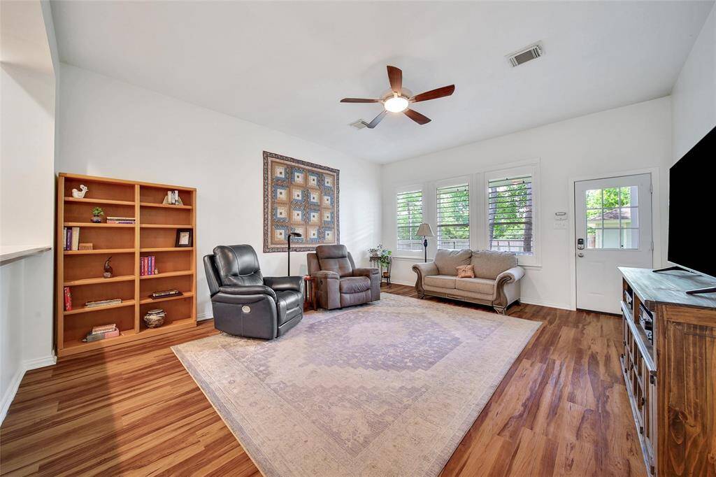 Spacious family room with plenty of natural light and room to relax.