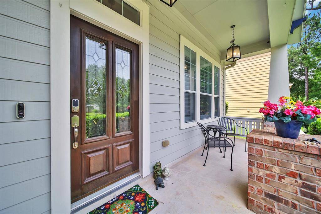 Adorable covered front porch – perfect for relaxing with morning coffee.