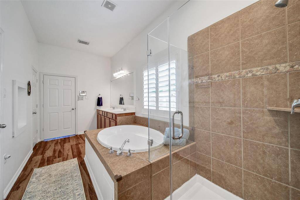 Walk-in shower with modern finishes adds a touch of everyday luxury