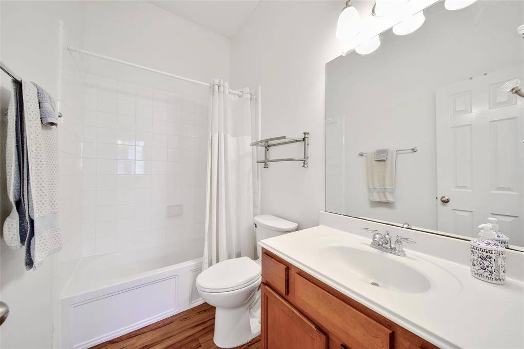 Full-size tub in guest bath for family convenience.