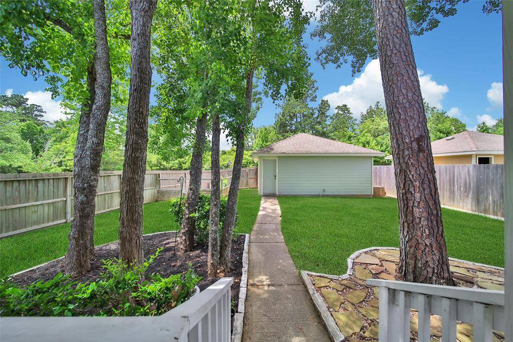 Low-maintenance yard with room for pets or playsets.