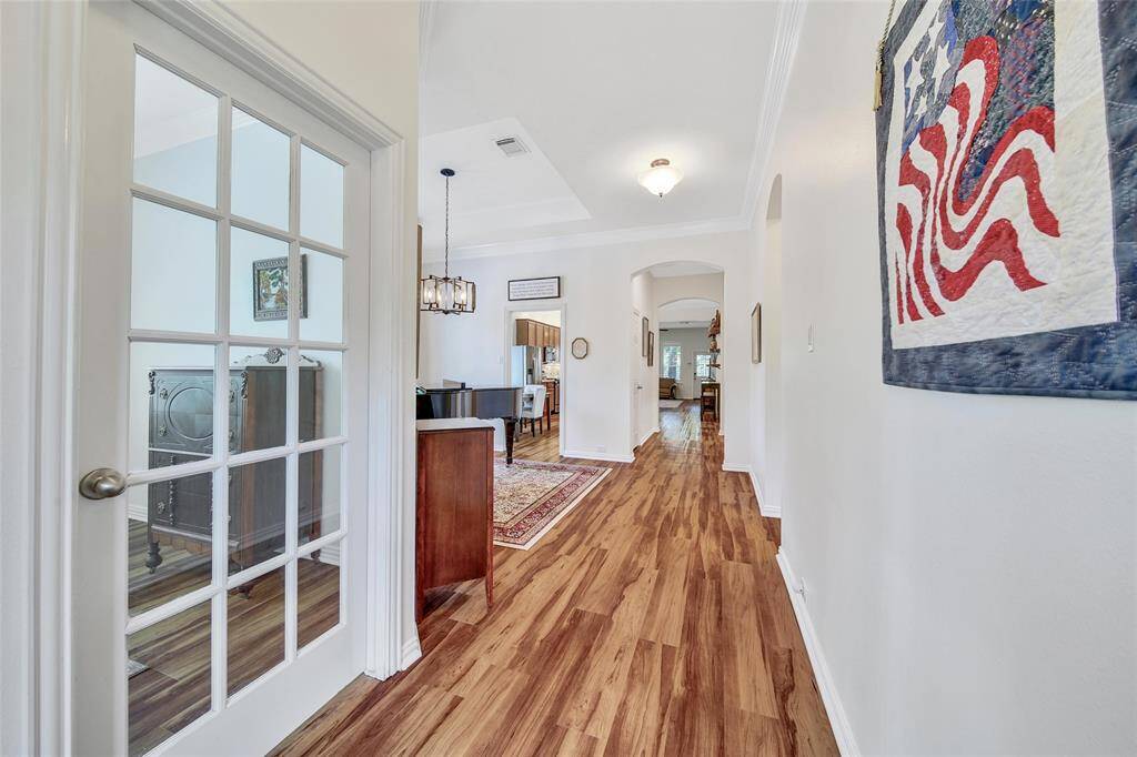 Light-filled entry with classic Craftsman trim and stylish touches.