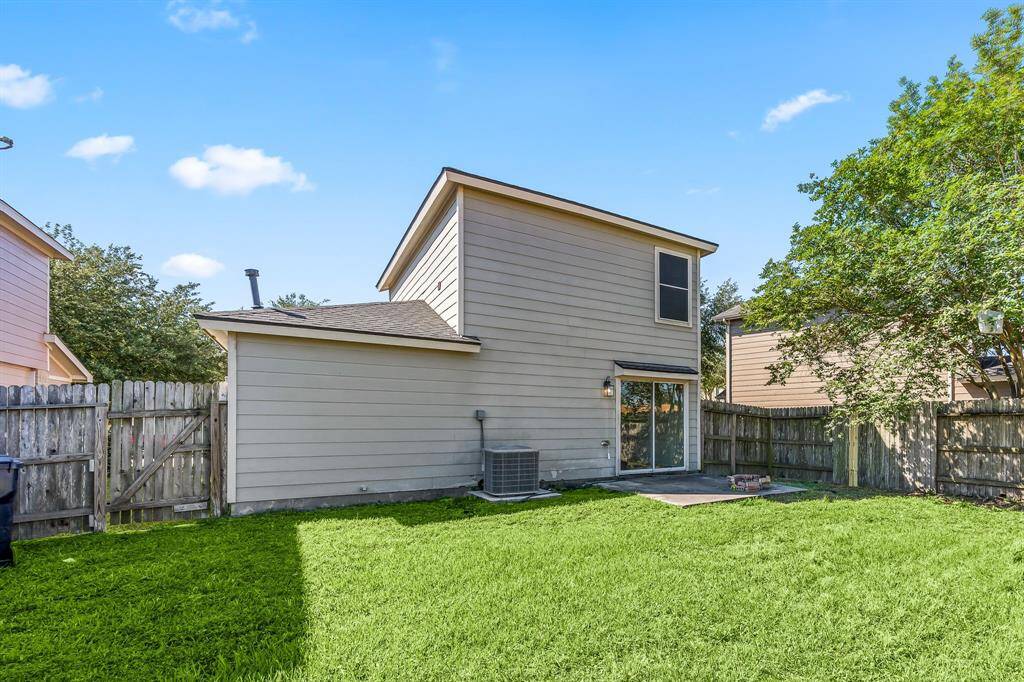 Fully fenced yard ready for pets, play, or raised-bed gardening, offering flexible space to craft the outdoor lifestyle you love.