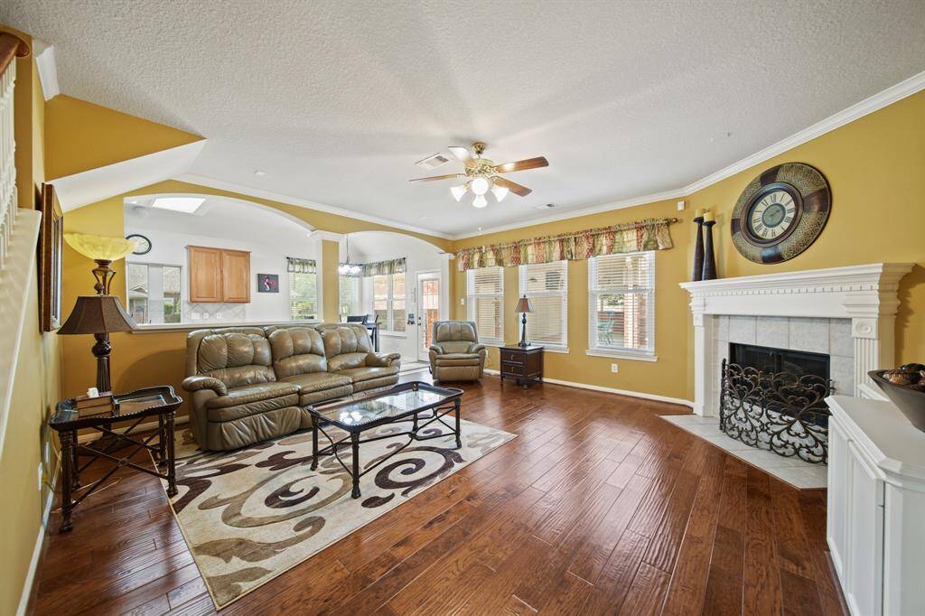 Enjoy a cozy gas fireplace & beautiful views of the outdoor space.