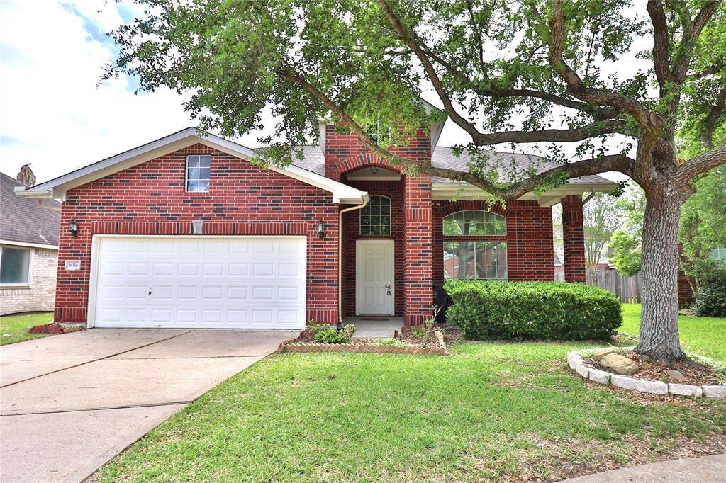 This inviting 4 beds/2.5 brick 2 story home features a two-car garage, a charming front porch.