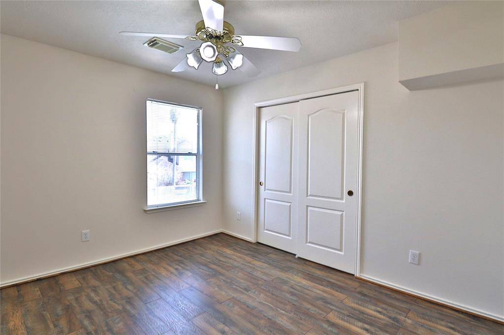 secondary bedroom  #2 with a ceiling fan