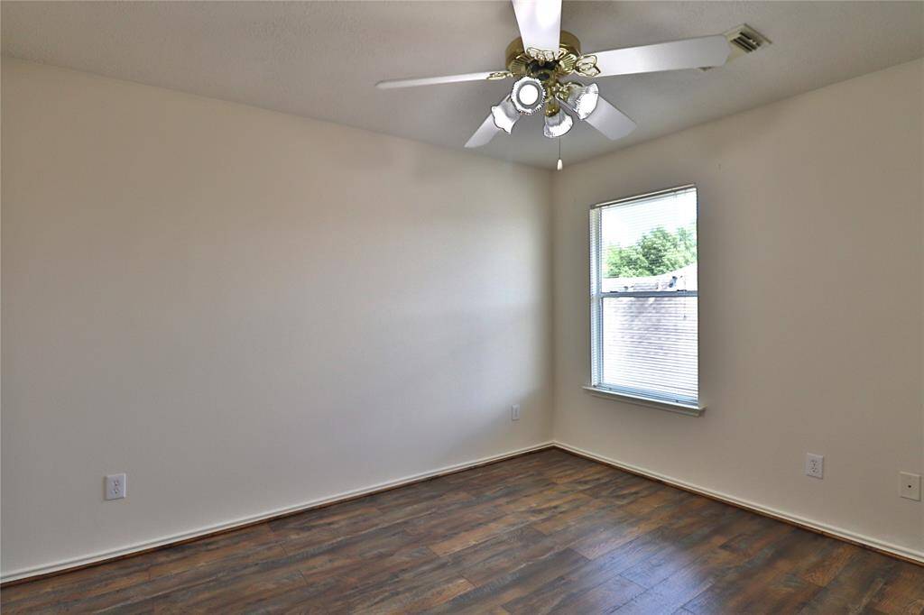 secondary bedroom #3 with a ceiling fun.