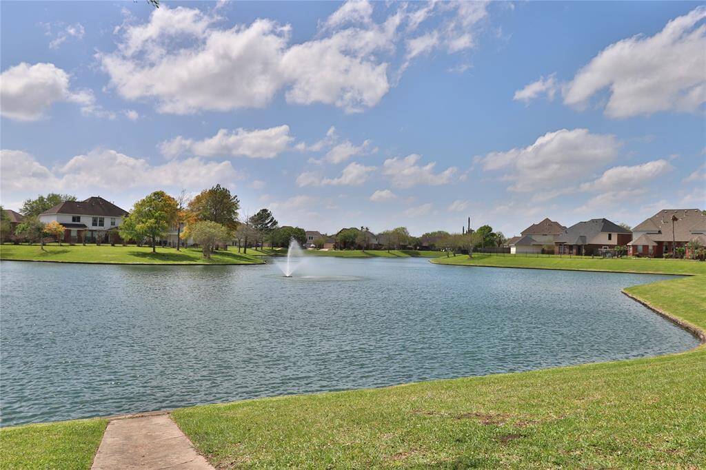 Stunning community lake offering serene views and a tranquil setting.
