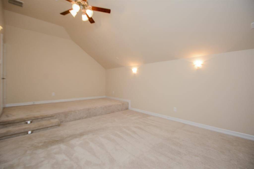 Media Room! This stepped area on the 2nd level and the wall lighting fixtures say entertainment and the latest movies! Bring in your prized pieces!