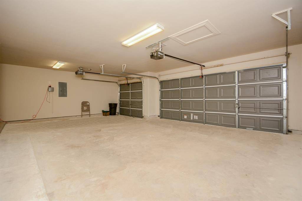 This pristine, multiple vehicle garage is well-kept and huge!