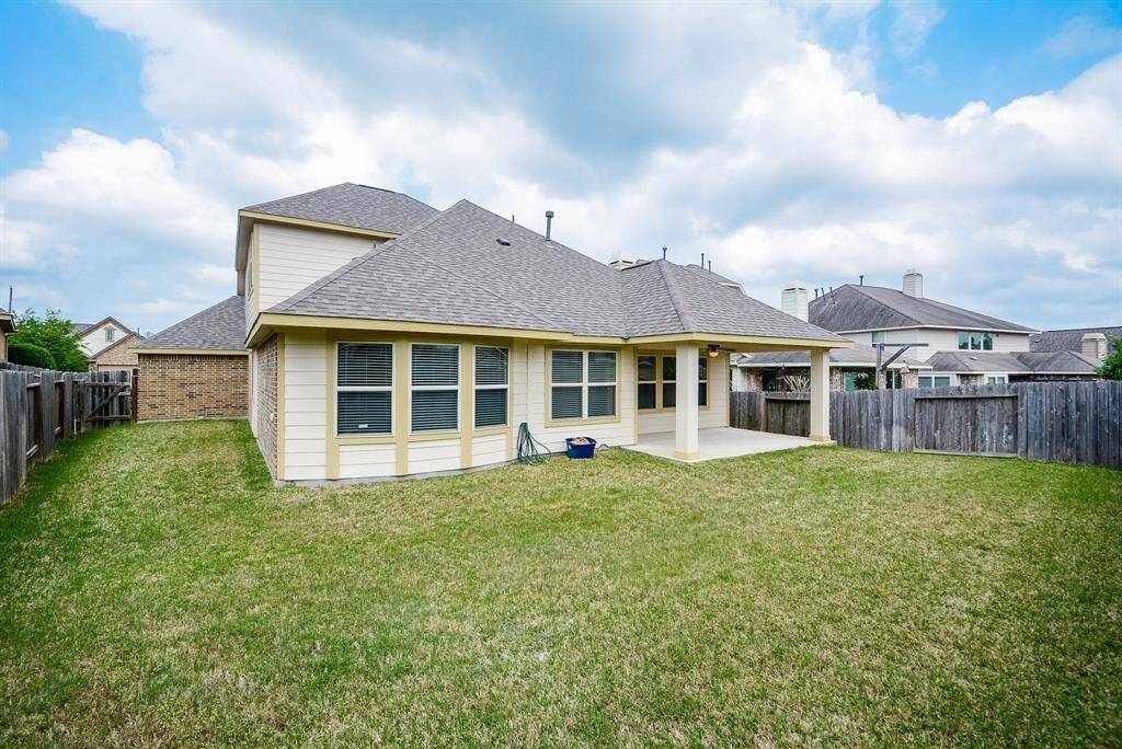 You've got plenty of green space out here! Imagine cookouts, family gatherings and lots of room for your darling family pet to run about!