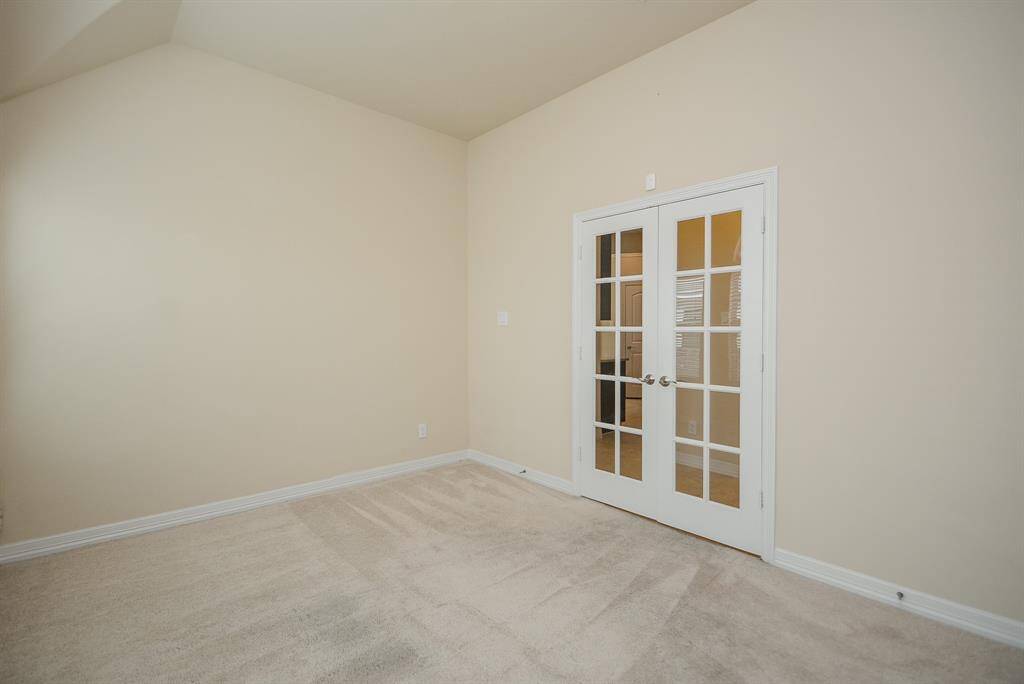 Study is enclosed by classic french doors, which always add a sophisticated touch to any entrance. Close them or open them! It's all up to you!