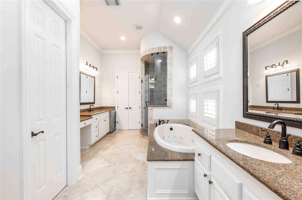 Primary Bath With Jetted Tub & His/Her Vanities