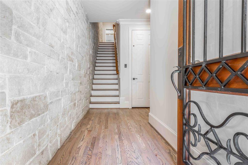 Welcome Home! Notice The Elegant Limestone Accent Wall Detailing As You Step Into Your Foyer