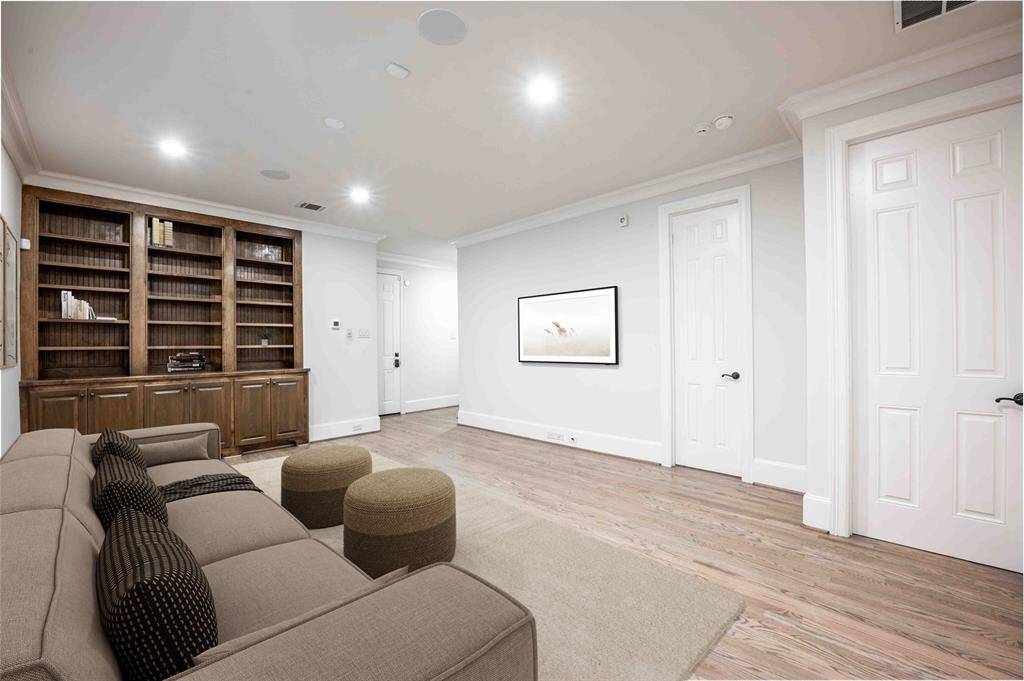 1st Floor Flex Room With Custom Built Ins & In Wall Speakers (Virtually Staged)