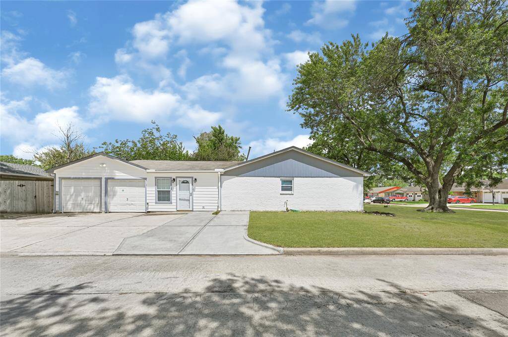 Garage and extra large driving way