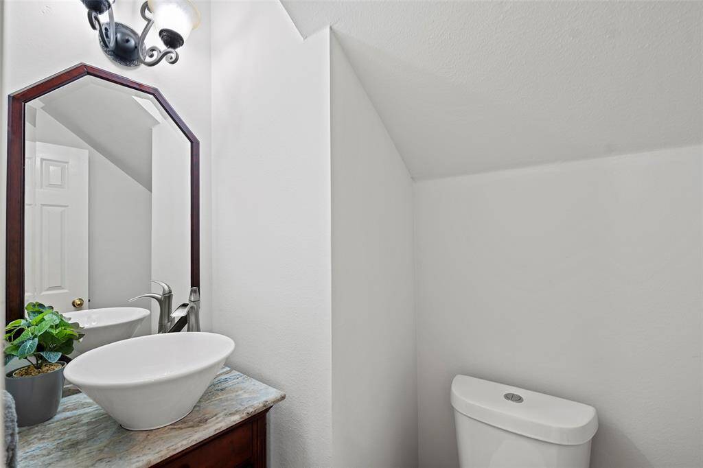 Convenient half bath downstairs.